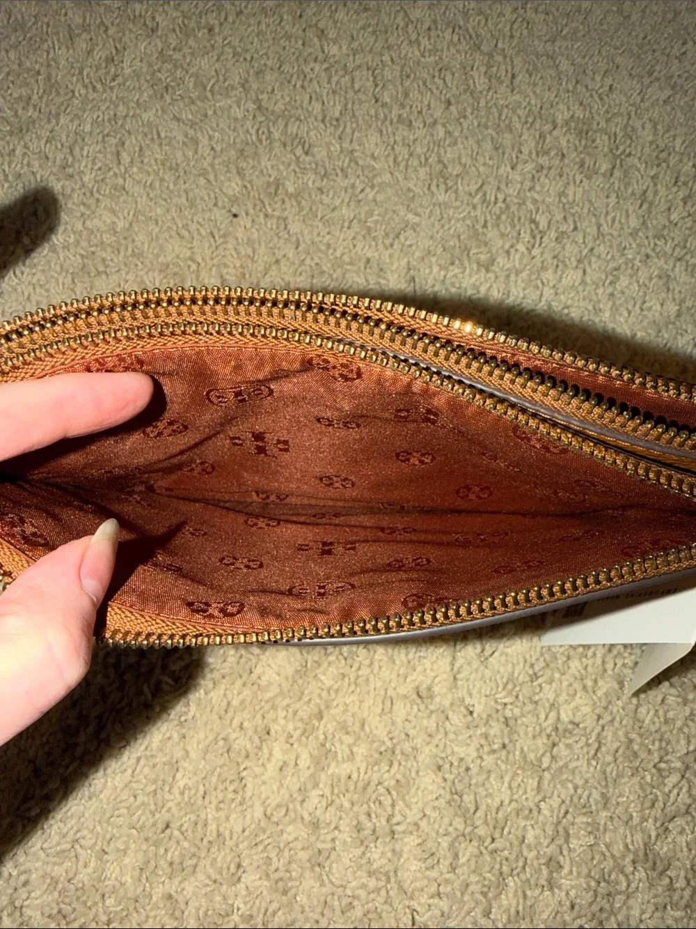 Tory Burch Blake Double Zip Slim Crossbody bag in a brown pebbled leather